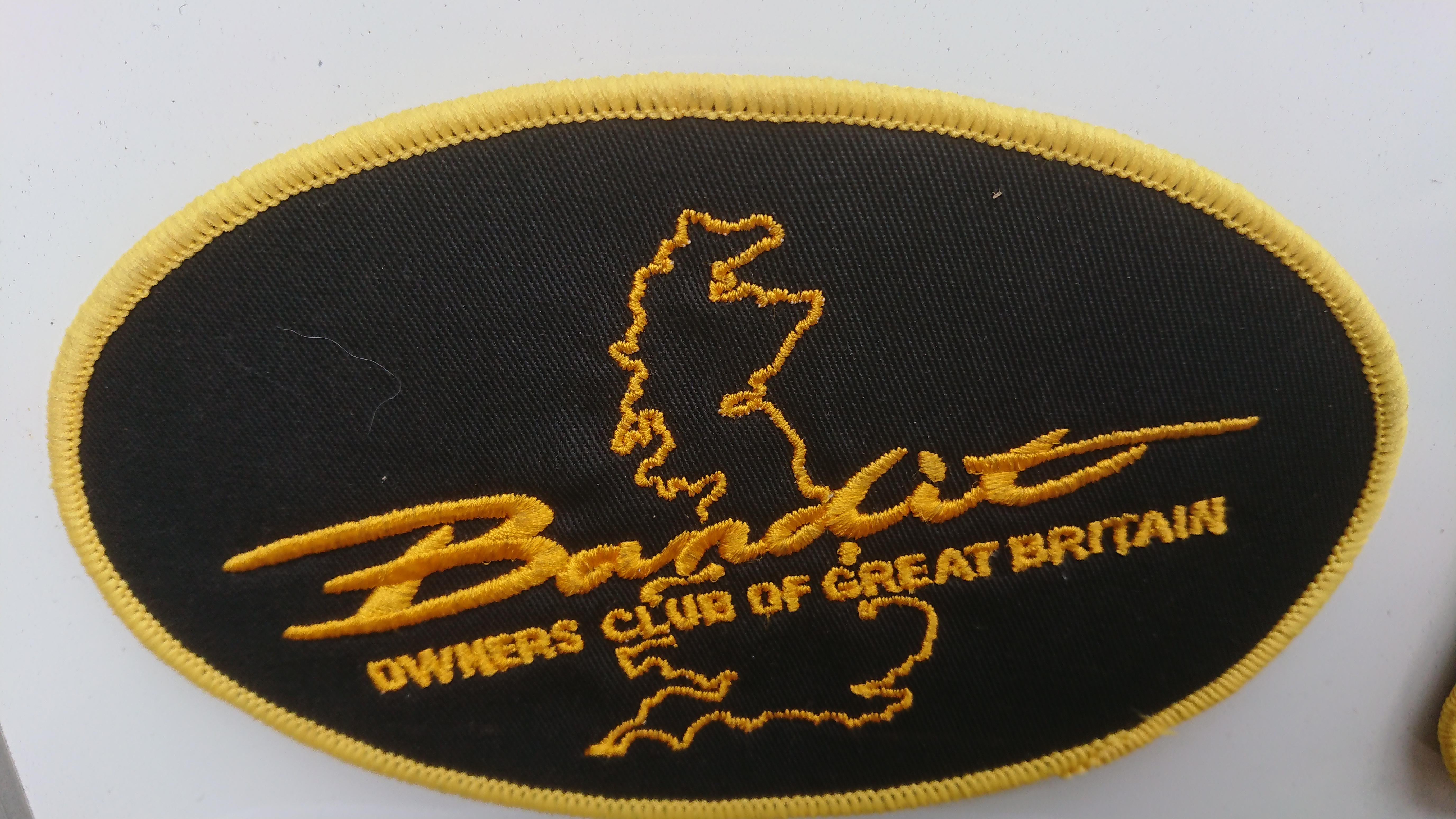 oval club patch gold,